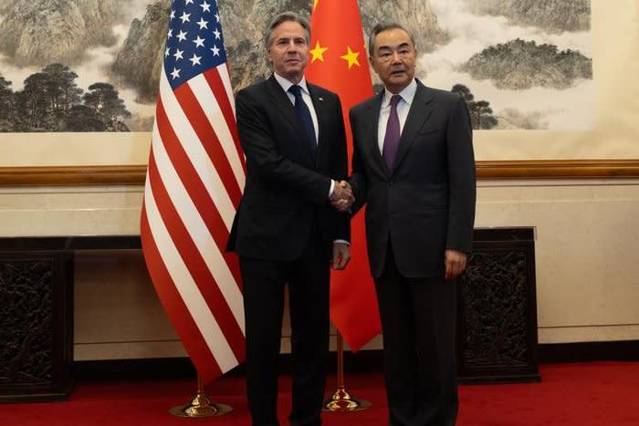 Secretary of State Antony Blinken (L) and China's foreign minister Wang Yi shake hands in Beijing on Friday when the two held a closed-door meeting. Photo courtesy of Secretary of State Antony Blinken/X