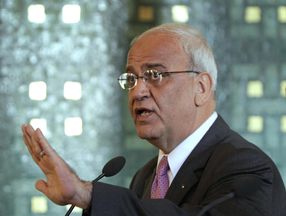 FILE - In this Oct. 2, 2011 file photo, chief Palestinian negotiator Saeb Erekat, speaks during a press conference at the Arab League headquarters in Cairo, Egypt. Erekat, a veteran peace negotiator and prominent international spokesman for the Palestinians for more than three decades, has died Tuesday, Nov. 10, 2020. He was 65. (AP Photo/Amr Nabil, File)