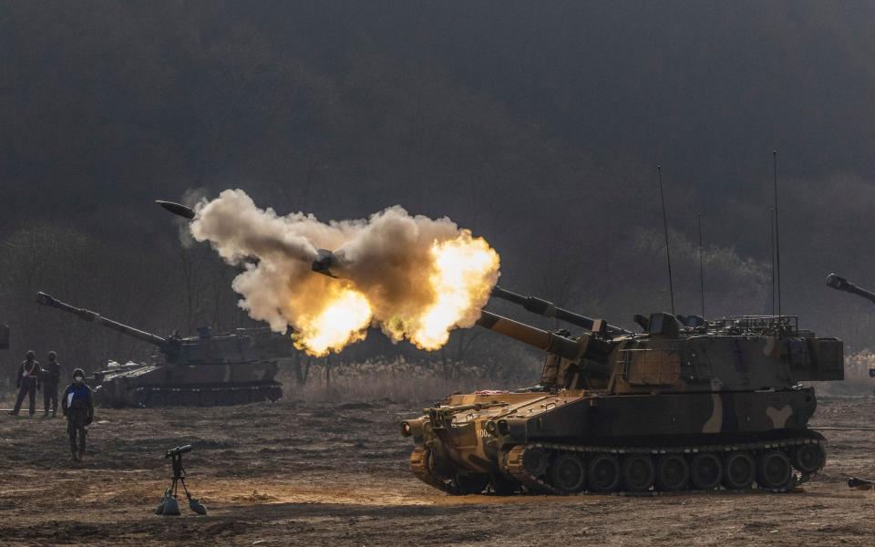 Polish soldiers conduct an artillery live-fire drill with K-55A1 self-propelled howitzers at an army training range in Paju, South Korea in March - YONHAP/EPA-EFE/Shutterstock