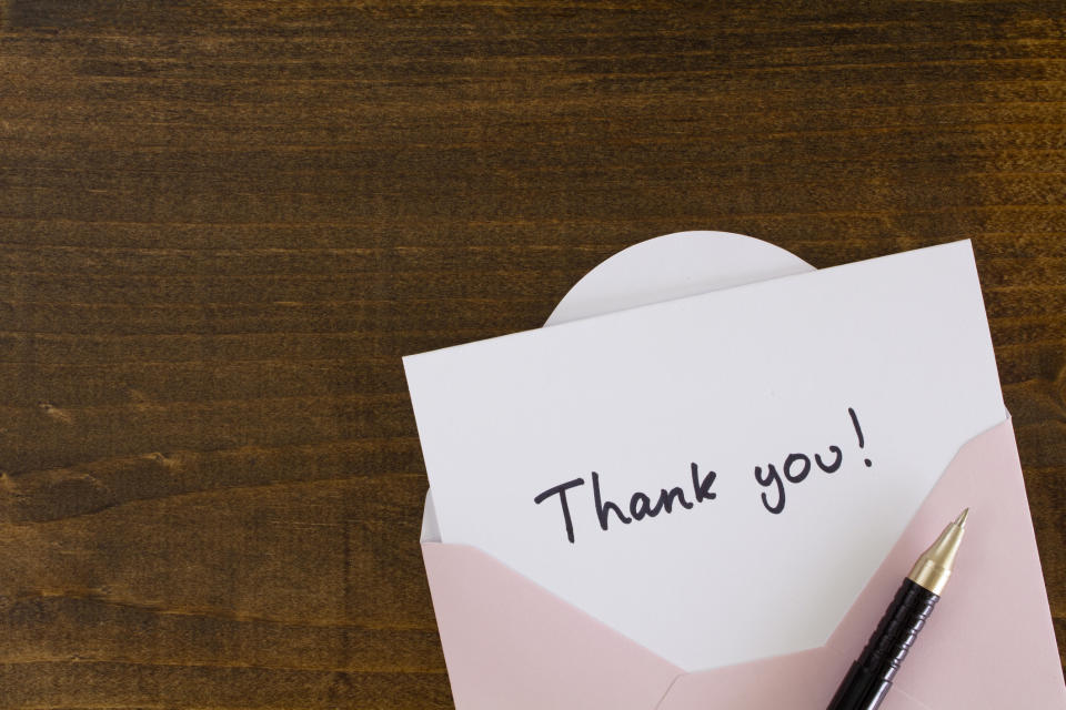 A handwritten thank you card