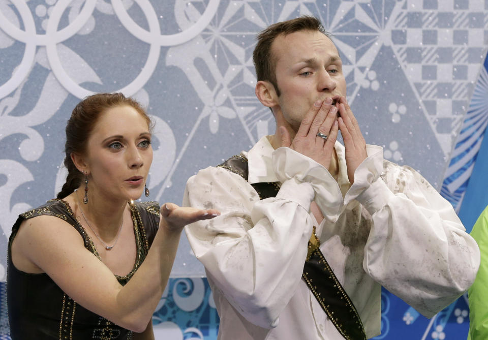 Maylin Wende and Daniel Wende of Germany blow kisses to spectators in the results area after competing in the pairs free skate figure skating competition at the Iceberg Skating Palace during the 2014 Winter Olympics, Wednesday, Feb. 12, 2014, in Sochi, Russia. (AP Photo/Darron Cummings)