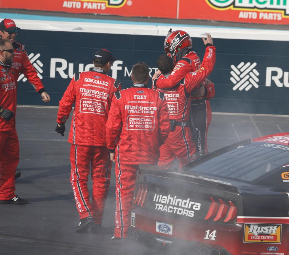 Mitchell's Chase Briscoe celebrates with his crew after winning his first NASCAR Cup Series race at Phoenix.