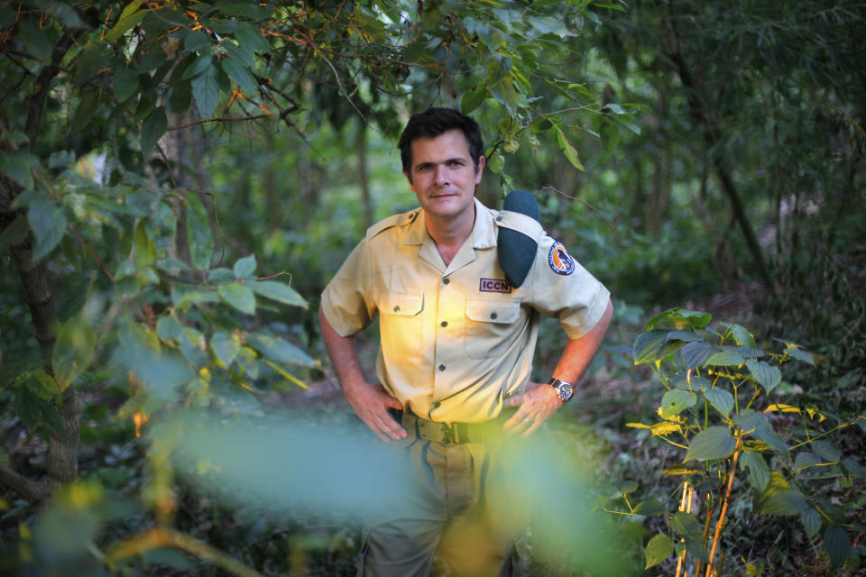 FILE- In this file photo taken on Wednesday, Aug. 11, 2012, Emmanuel de Merode, Virunga National Park director and chief warden, poses at the park headquarters in Rumangabo, some 60 kms (40 miles) north of Goma, eastern Congo. Park officials say the Belgian director of Africa's oldest national park, a reserve in conflict-ridden eastern Congo, has been shot and seriously wounded. Three gunmen ambushed de Merode on Tuesday, April 15 according spokeswoman Joanna Natasegara. A statement on the park's website said he was traveling between Goma, a main city in the east near Rwanda's border, and Rumangabo at the time Natasegara said Wednesday. (AP Photo/Jerome Delay,File)