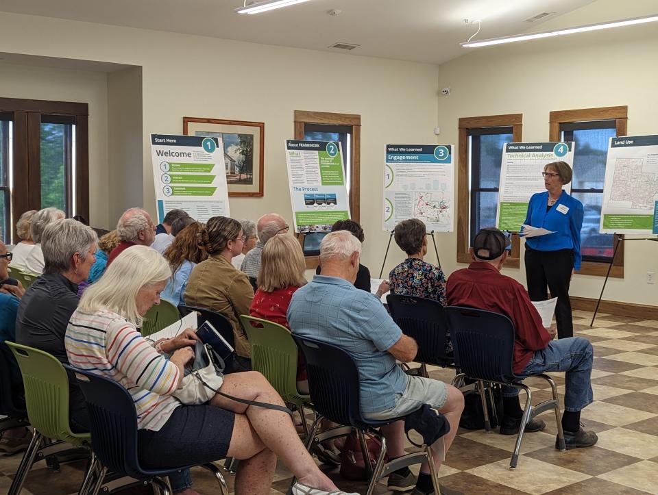 Evans Foundation Chairwoman Sarah Wallace presents to community members during a public open house in Framework's third round of public engagement June 7at the Mary E. Babcock Library in Johnstown.