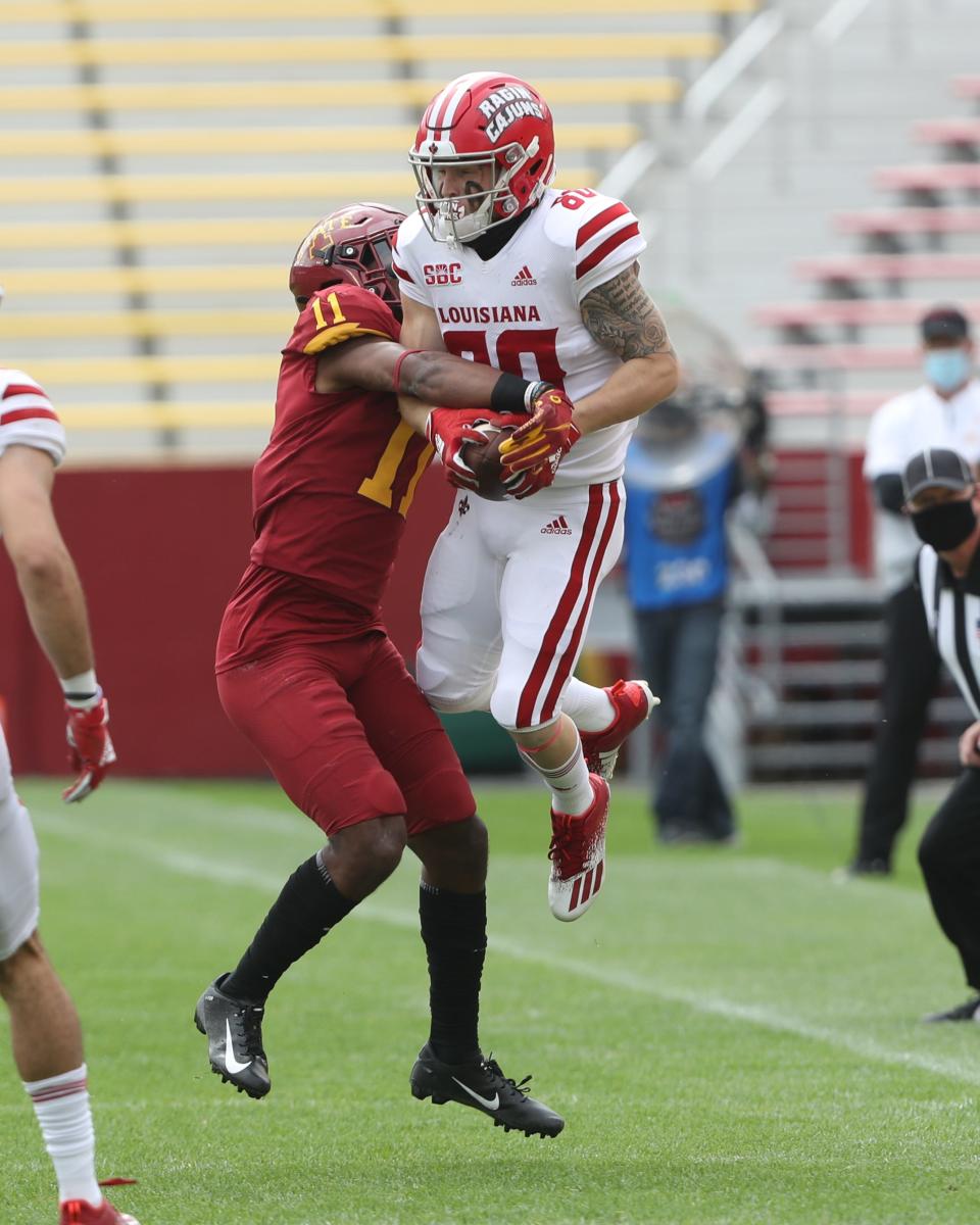 Sep 12, 2020; Ames, Iowa, USA; UL Ragin' Cajuns wide receiver Devon Pauley (80) catches a pass in front of Iowa State Cyclones defensive back Lawrence White IV (11) at Jack Trice Stadium. Mandatory Credit: Reese Strickland-USA TODAY Sports