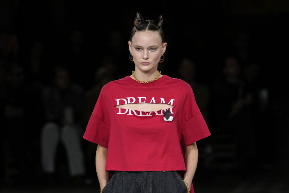 A model wears a creation for Undercover ready-to-wear Spring/Summer 2023 fashion collection presented Wednesday, Sept. 28, 2022 at the American cathedral in Paris. (AP Photo/Francois Mori)