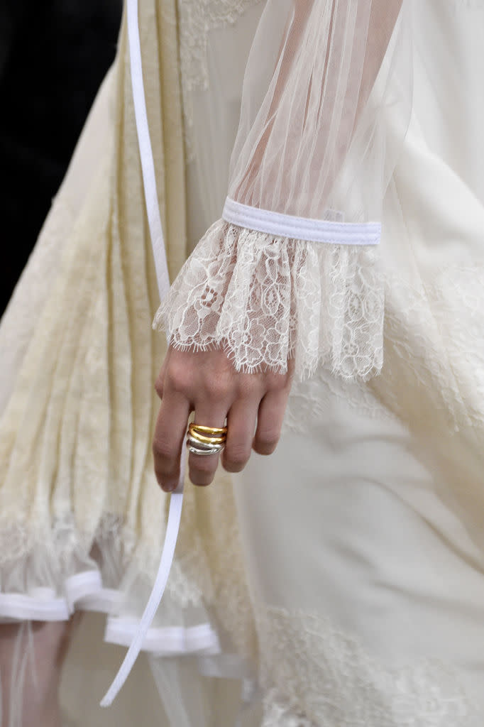 <p>Gold and silver stacked rings at the Tory Burch FW18 show. (Photo: Getty Images) </p>