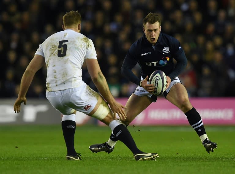 Scotland's full back Stuart Hogg (R), seen in February 2016, scored tries in both halves of his team's match against Georgia November 26, 2016