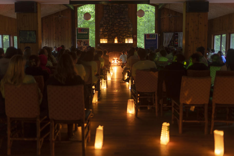 Campers, buddies, and staff gather for a memorial ceremony.<span class="copyright">Ilona Szwarc for TIME</span>