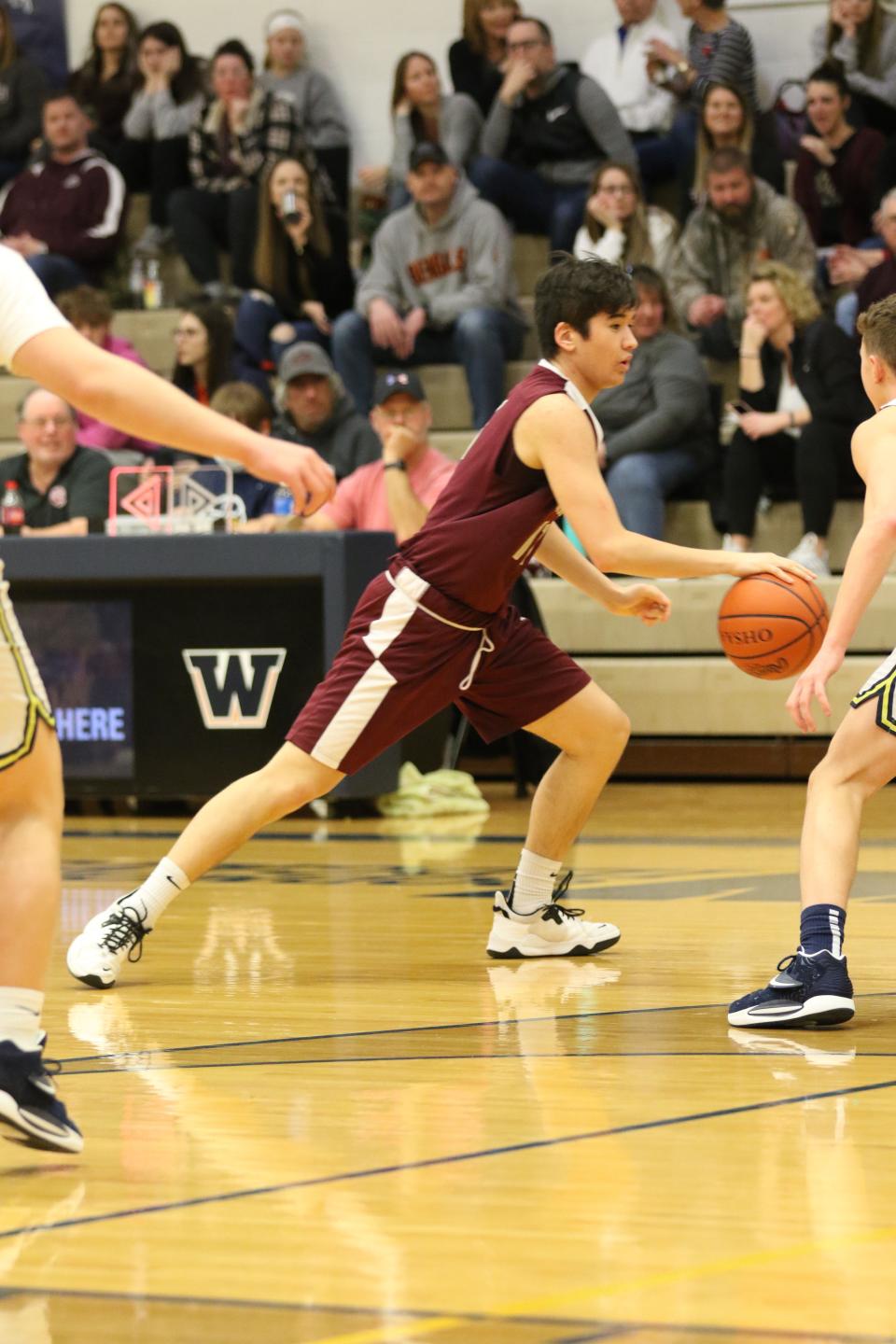 Genoa's Skylar Ju handles the ball.