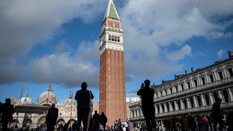 PHOTO: Tourists visit San Marco Square on April 24, 2024 in Venice, Italy. (Marco Bertorello/AFP via Getty Images)