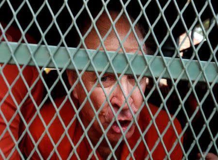 Australian filmmaker James Ricketson speaks to journalists as he arrives at the Municipal Court of Phnom Penh, Cambodia August 20, 2018. REUTERS/Samrang Pring