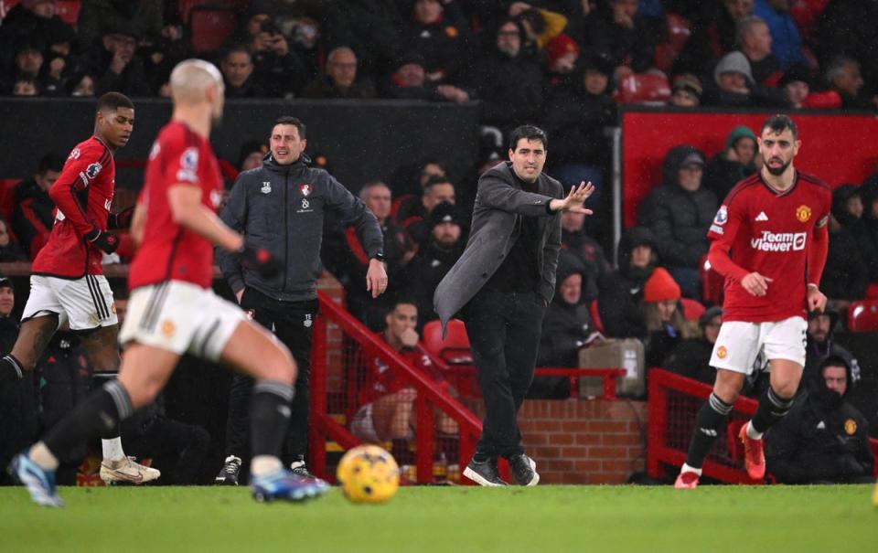 Iraola directs his players from the touchline at Old Trafford (Getty)