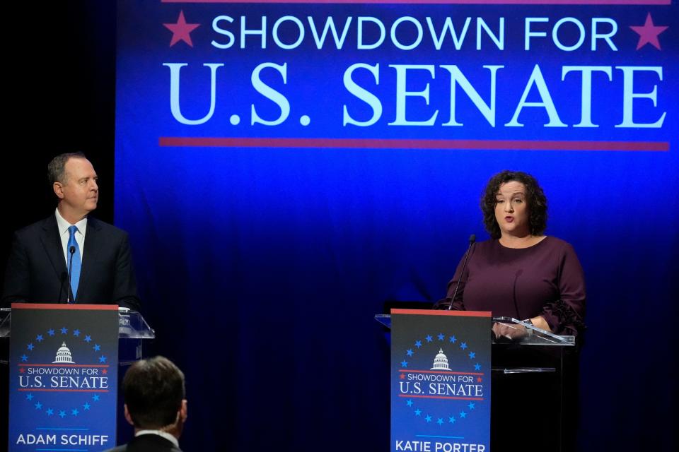 U.S. Rep. Adam Schiff, D-Calif., left, looks on as U.S. Rep. Katie Porter, D-Calif., speaks during a televised debate for candidates in the senate race to succeed the late California Sen. Dianne Feinstein, Monday, Jan. 22, 2024, in Los Angeles.