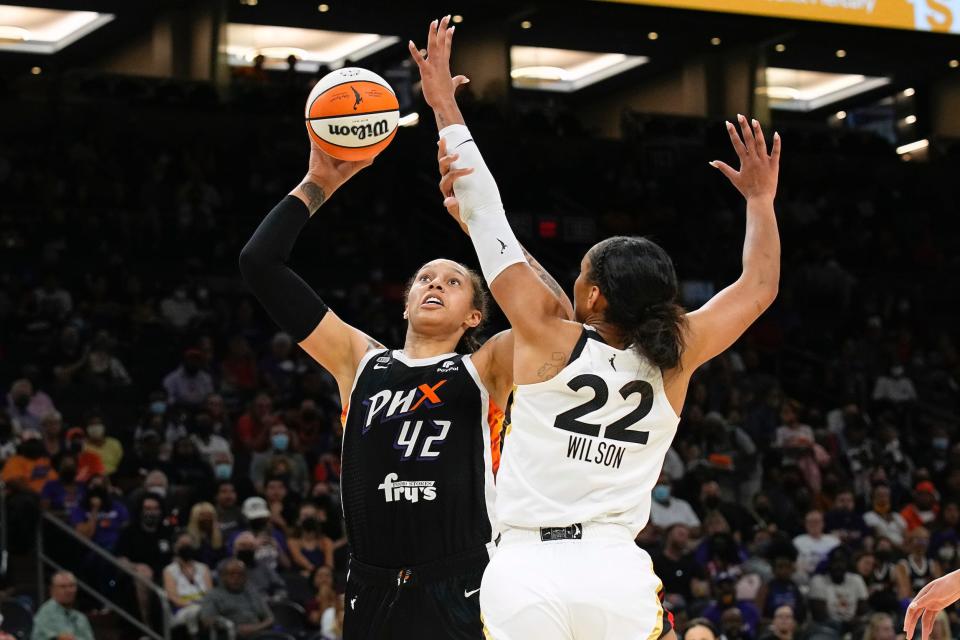 Brittney Griner (left) shoots over fellow WNBA All-Star A'ja Wilson.