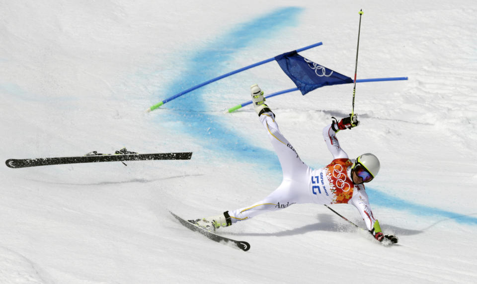 Andorra's Joan Verdu Sanchez crashes in the first run of the men's giant slalom at the Sochi 2014 Winter Olympics, Wednesday, Feb. 19, 2014, in Krasnaya Polyana, Russia. (AP Photo/Charles Krupa)