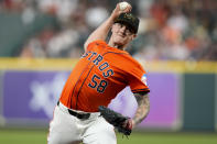 Houston Astros starting pitcher Hunter Brown delivers to a Milwaukee Brewers batter during the first inning of a baseball game Friday, May 17, 2024, in Houston. (AP Photo/Eric Christian Smith)