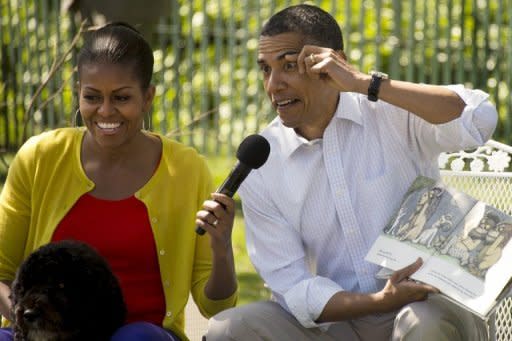 US President Barack Obama (R) reads "Where the Wild Things Are" with First Lady Michelle Obama during the White House Easter Egg Roll in April 2012. The story, in which Max, wearing a wolf suit, is sent to his bedroom by his mother, but leaves for a mysterious land where he tames enormous monsters, was controversial at first. Some libraries refused to stock the book