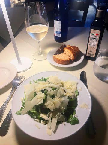 <p>Marissa Charles</p> The Forte Forte salad features radicchio and arugula topped with shaved slices of parmesan cheese, mixed with balsamic dressing. Diners can pair this with a glass of Prosecco. Slices of bread dipped in olive oil are also available.