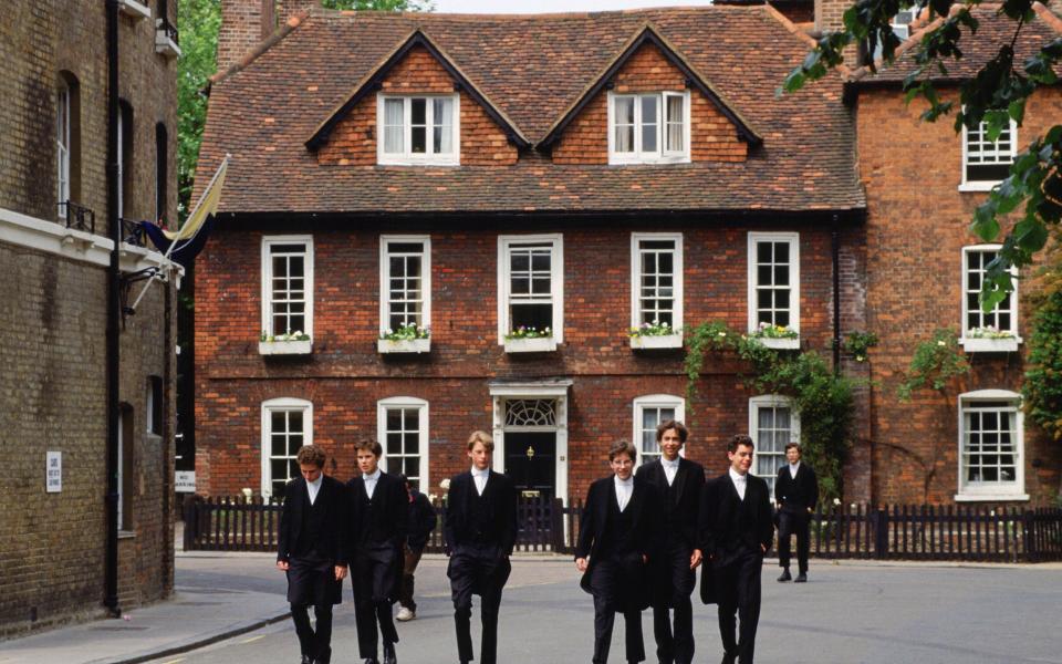 Eton schoolboys in traditional tailcoats