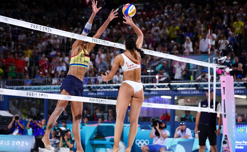 Women's beach volleyball players at the Paris Olympics.