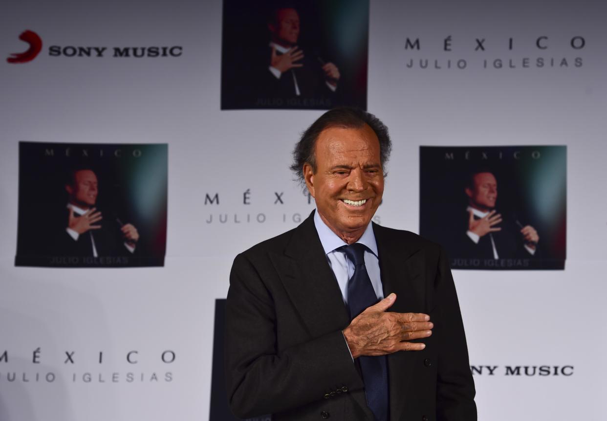 Spanish singer Julio Iglesias gestures before a press conference in Mexico city, on September 23, 2015. Iglesias is in Mexico to promote his new album 