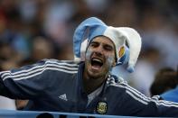 <p>In good voice: An Argentinian fan hopes to roar his tem on to victory over Croatia. (AP) </p>