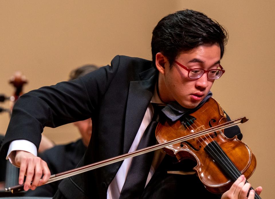 Julian Rhee performs Wednesday, Sept. 21, 2022, at Butler University for the classical finals for the International Violin Competition of Indianapolis. The competition takes place every four years, and is open to young violinists. The East Coast Chamber Orchestra accompanied the musicians during selected Mozart and Kreisler pieces.