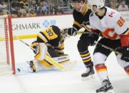 Feb 16, 2019; Pittsburgh, PA, USA; Calgary Flames left winger Andrew Mangiapane (88) gets a first period goal past Pittsburgh Penguins goalie Matt Murray (30) at PPG PAINTS Arena. Mandatory Credit: Philip G. Pavely-USA TODAY Sports