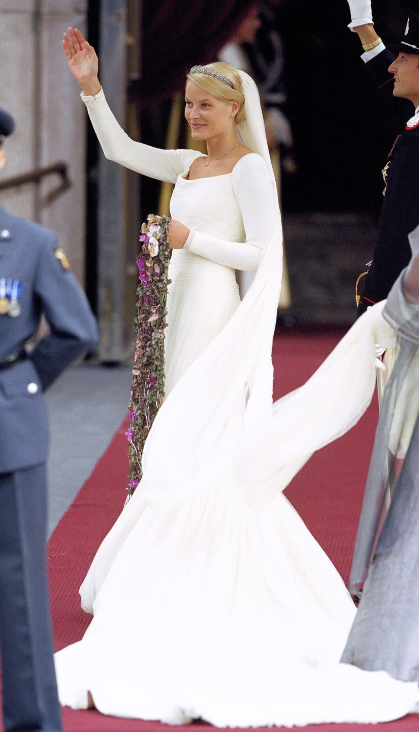 <p>Norway's crown princess choose a simple yet stunning long-sleeve gown and matching veil for her wedding to the country's future king.</p>