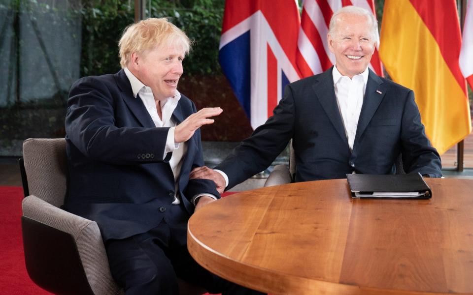 Boris Johnson and Joe Biden share a joke at the G7 summit in southern Germany today - Stefan Rousseau/PA