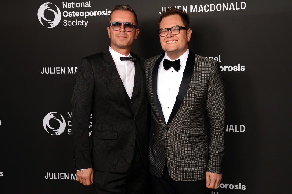 Alan Carr (R) and Paul Drayton attend the Julien Macdonald Fashion Show for National Osteoporosis Society at Lancaster House on November 21, 2018 in London, England. (Photo by Dave J Hogan/Dave J Hogan/Getty Images for the National Osteoporosis Society)