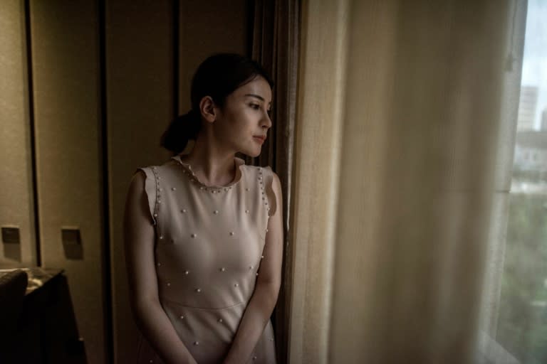 "I got addicted to surgery and yet was never satisfied with myself. I am not against plastic surgery but you have to be yourself instead of turning into others," Sun Yibing, a internet celebrity in China, told AFP