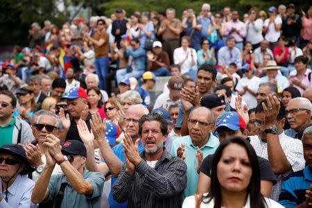 People attend a session of Venezuela's opposition-controlled National Assembly to appoint new magistrates of the Supreme Court in Caracas, Venezuela, July 21, 2017. REUTERS/Carlos Garcia Rawlins