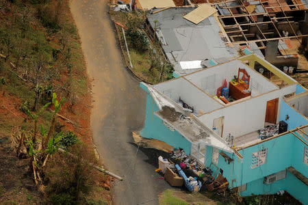 The contents of a home are seen from the air during recovery efforts following Hurricane Maria near Utuado, Puerto Rico, October 10, 2017. REUTERS/Lucas Jackson