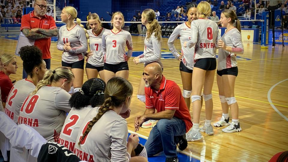 Smyrna head coach Daniel Wandless addresses his team during a semifinal matchup against Caesar Rodney. Smyrna won to advance to the volleyball state title game.