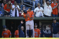 Houston Astros' Jose Altuve, front, celebrates his home run with Jose Siri, back, during the ninth inning of a baseball game against the Washington Nationals, Sunday, May 15, 2022, in Washington. (AP Photo/Nick Wass)