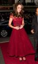 <p>The Duchess of Cambridge enjoyed a night on the town at the Theatre Royal for the West End premiere of <em>42nd Street</em>. The production was affiliated with the East Anglia's Children's Hospice, of which the Duchess is a patron. She arrived in a sheer, crimson Marchesa dress embedded with a subtle gem-lined belt. Her maroon clutch matched her shoes as well as her Oscar de la Renta earrings. </p>