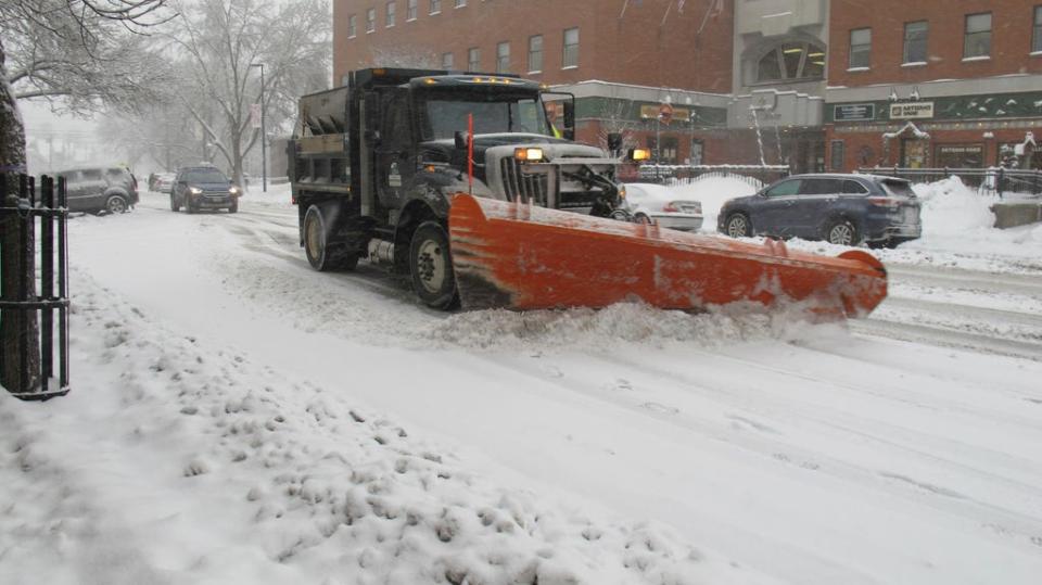 A city plow helps keep city streets clear of snow on Feb. 7, 2020, in Montpelier, Vt.  More snow is forecast this week from the Midwest to norrthern New England.