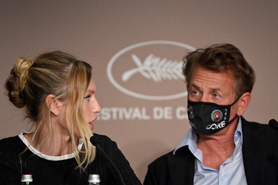 Dylan Penn, left, and father Sean Penn during a news conference for "Flag Day" at Cannes Film Festival.