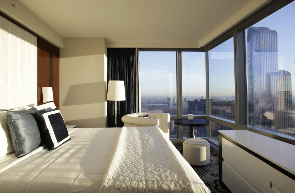 A room on the 62nd floor of the Courtyard-Residence Inn Central Park is shown overlooking midtown Manhattan, Wednesday, Jan. 8, 2014 in New York. The Council on Tall Buildings and Urban Habitat in Illinois, which compiles lists of tall buildings, is listing the building as the tallest hotel in North America. (AP Photo/Mark Lennihan)