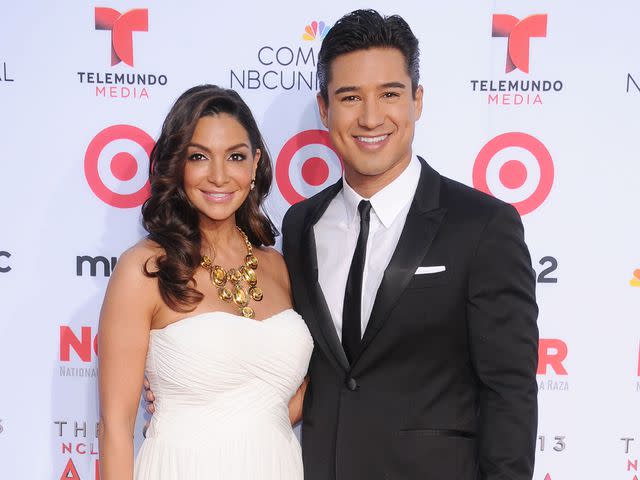 <p>Gregg DeGuire/WireImage</p> Mario Lopez and wife Courtney Mazza in 2013