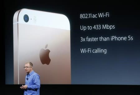 Apple Vice President Greg Joswiak introduces the iPhone SE during an event at the Apple headquarters in Cupertino, California March 21, 2016. REUTERS/Stephen Lam