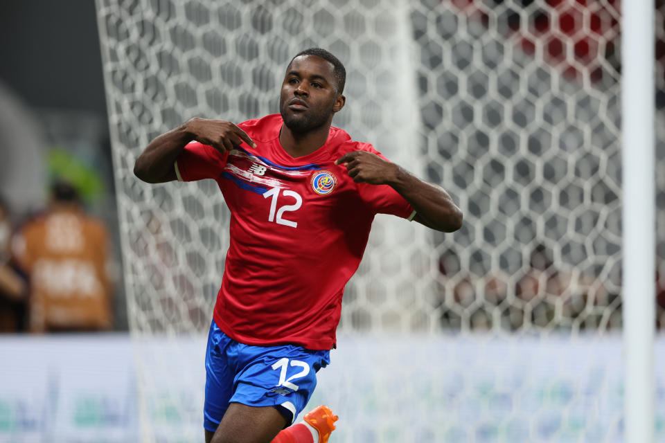 DOHA, QATAR - JUNE 14: Joel Campbell of Costa Rica celebrates after scoring a goal to make it 1-0 in the 2022 FIFA World Cup Playoff match between Costa Rica and New Zealand at Ahmad Bin Ali Stadium on June 14, 2022 in Doha, Qatar. (Photo by Matthew Ashton - AMA/Getty Images)