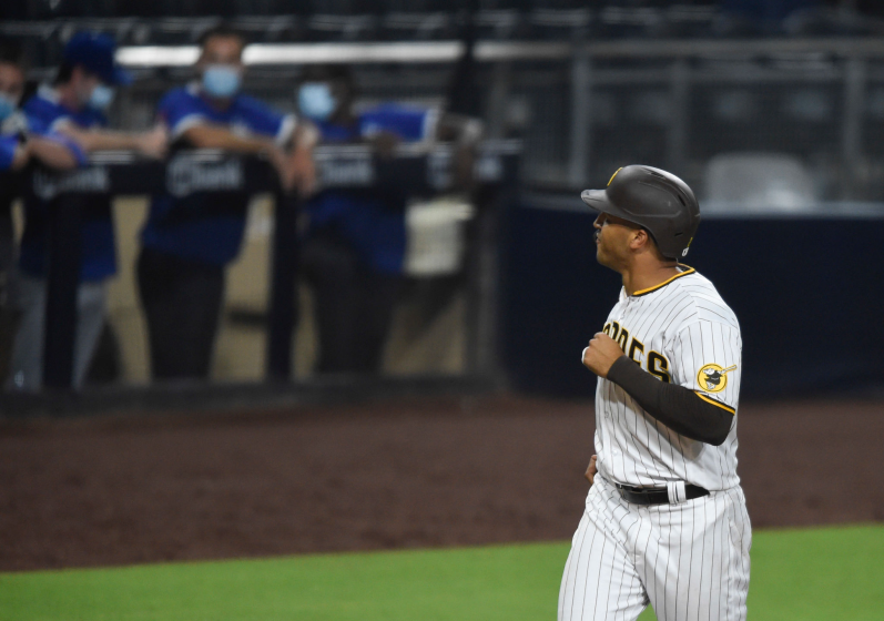 San Diego Padres' Trent Grisham looks to the Dodgers dugout after hitting a solo home run during the sixth inning