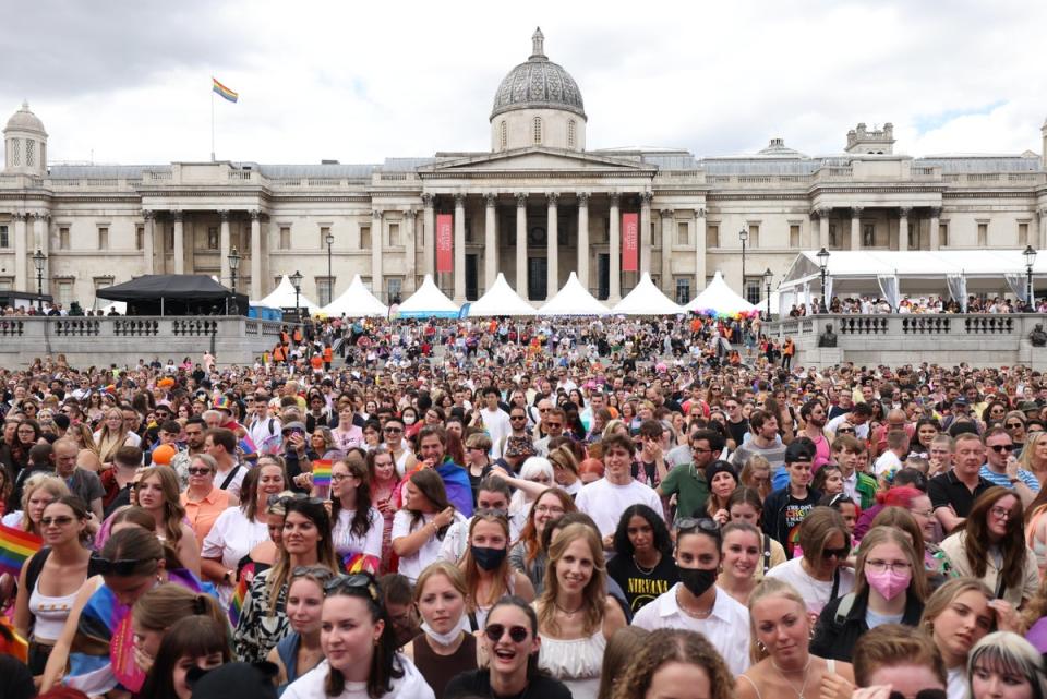 People in Trafalgar Square take part in the celebrations (James Manning/PA) (PA Wire)