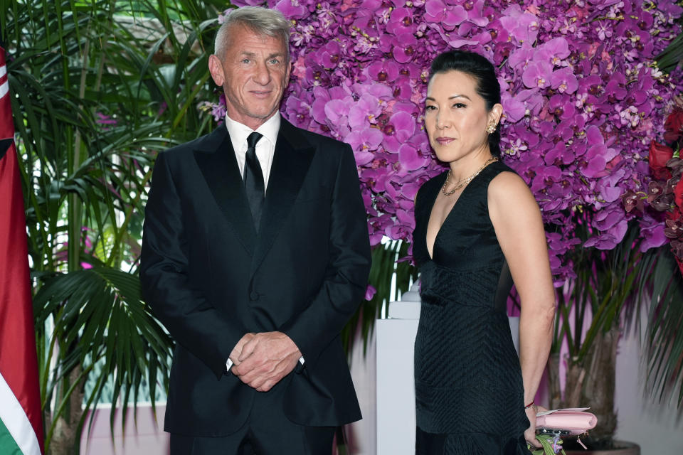 Sean Penn and Ann Lee arrive at the Booksellers area of the White House for the State Dinner hosted by President Joe Biden and first lady Jill Biden for Kenya's President William Ruto and Kenya's first lady Rachel Ruto, Thursday, May 23, 2024, in Washington. (AP Photo/Jacquelyn Martin)