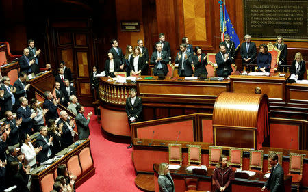 Senators applause the new elected Senate president Forza Italia party's Maria Elisabetta Alberti Casellati during the second session day since the March 4 national election in Rome, Italy March 24, 2018. REUTERS/Remo Casilli