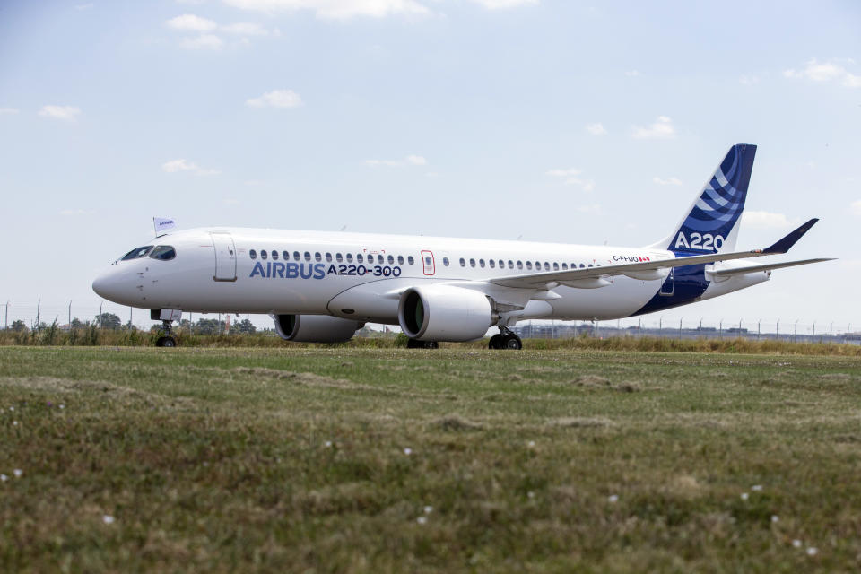 An Airbus A220 taxis at Toulouse-Blagnac airport, southwestern France, Tuesday, July 10, 2018. Airbus unveiled its new A220 aircraft Tuesday, with an A220-300 landing in the southwestern French town of Toulouse. The aircraft were formerly Bombardier C Series planes and are aimed at the 100-150 seat aircraft market. (AP Photo/Frederic Scheiber)