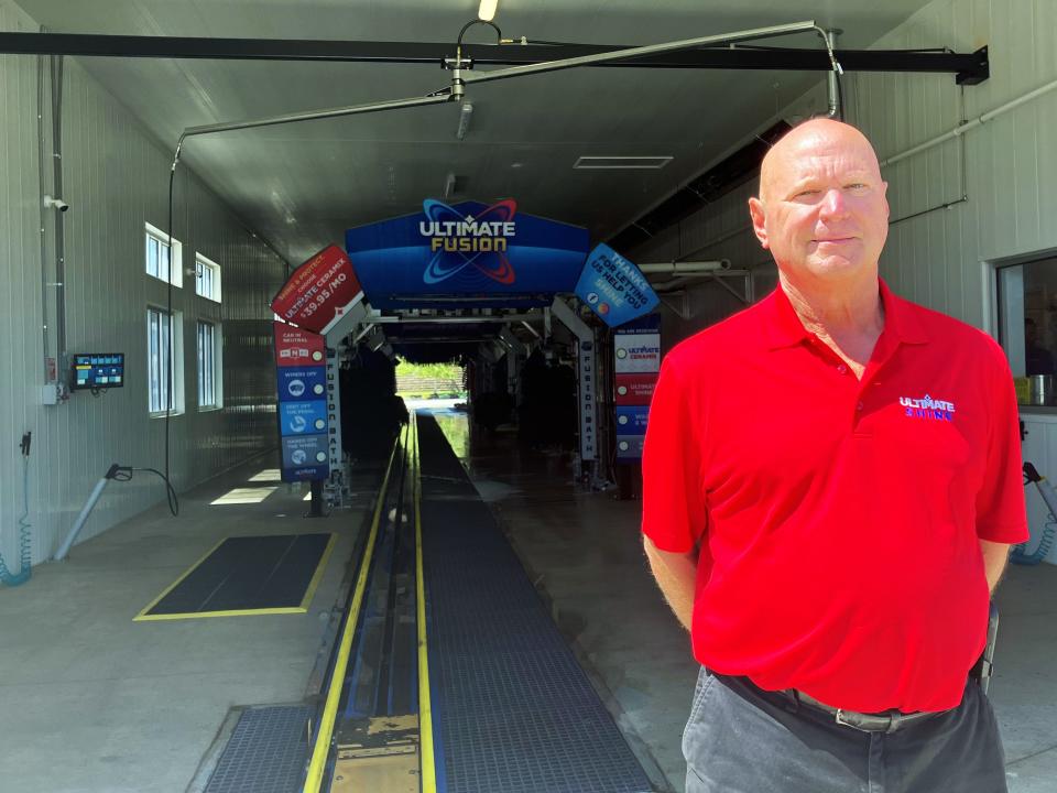 Owner Rick Rose stands in the entrance of Ultimate Shine Car Wash, which will hold its grand opening on Sept. 8 at its location on Northpointe Drive. The $6 million operation is the latest new business to open on the city's north end.
